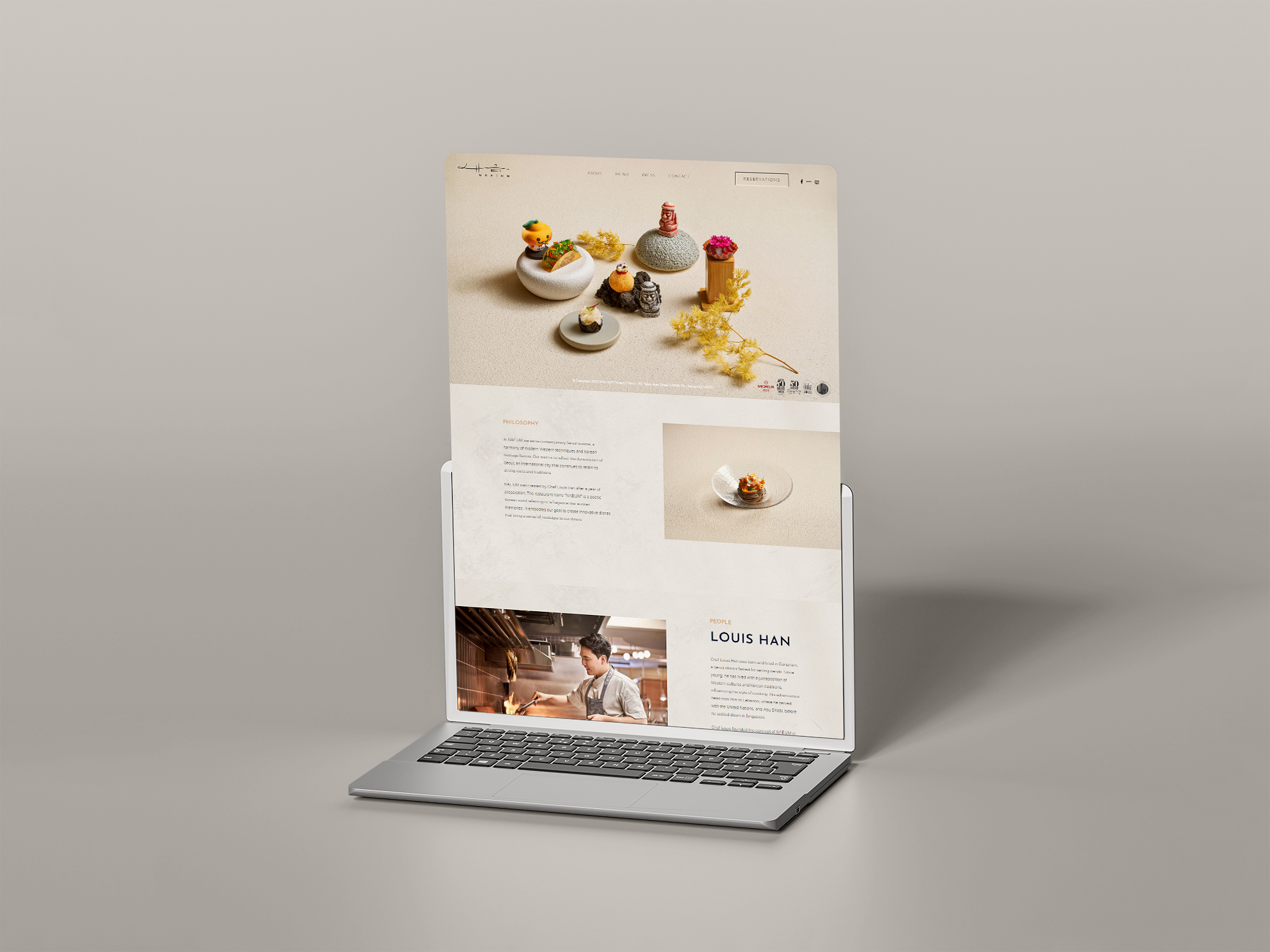 Laptop displaying elegant website design featuring modern aesthetics.