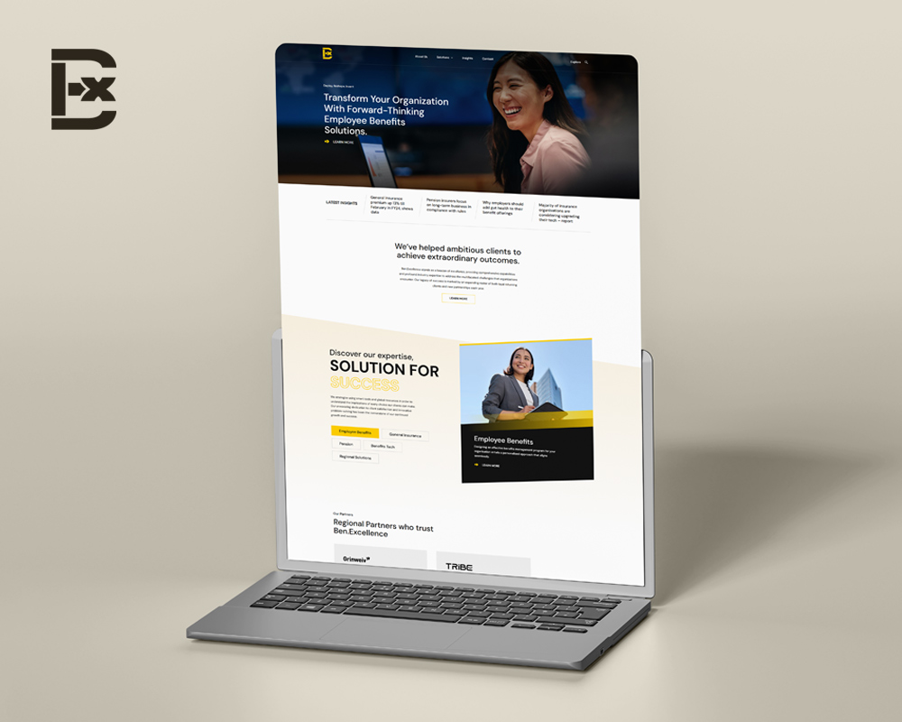 A sleek laptop displaying a professional web design business homepage in Singapore.